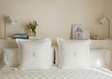 Llit confortable en Arkhé Hotel Boutique