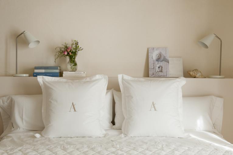 Cama confortable en Arkhé Hotel Boutique