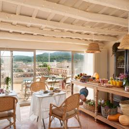 Salle de petit déjeuner à Arkhé Hotel Boutique